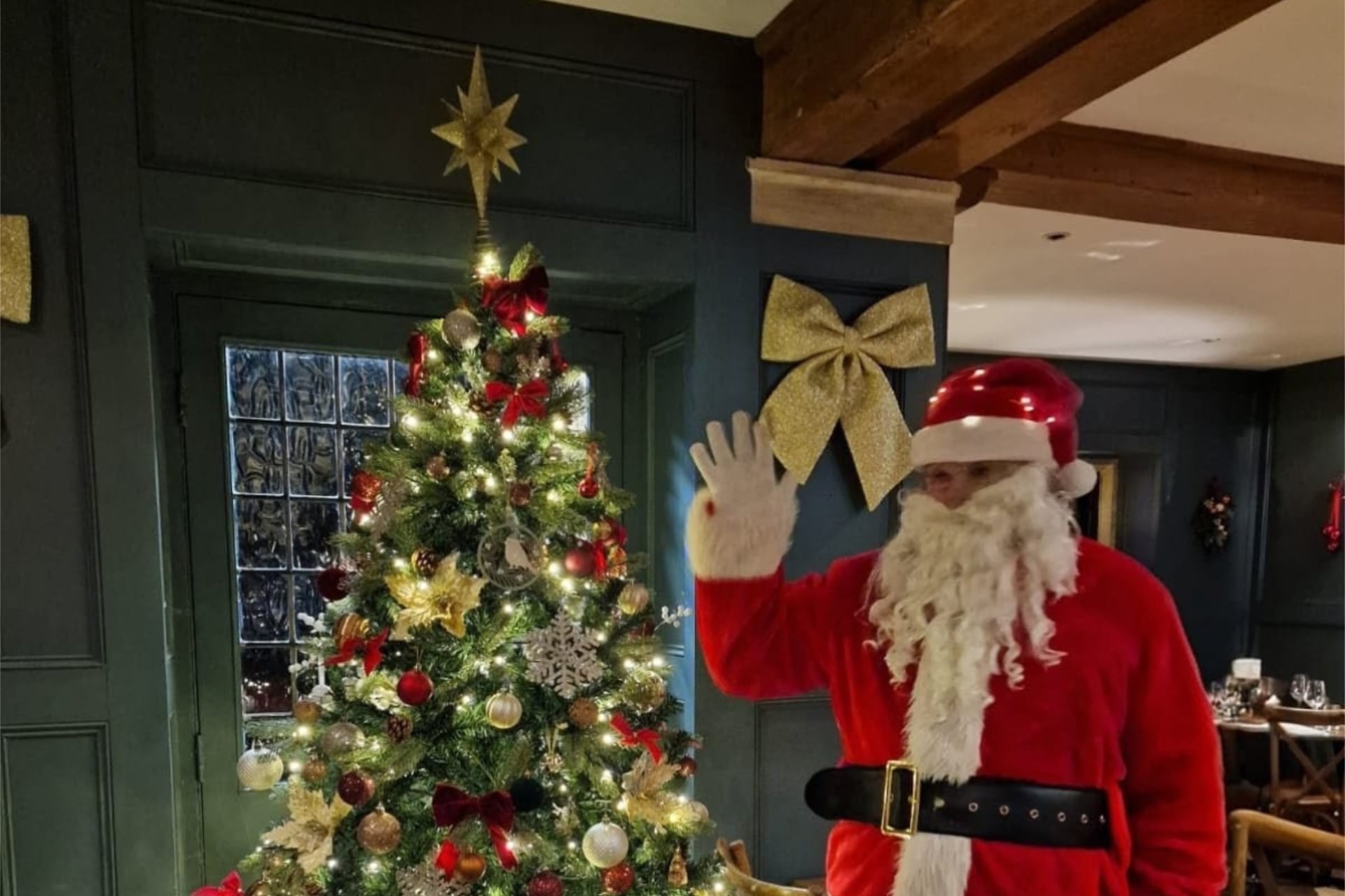 Father Christmas by a Christmas Tree at the Chequered Skipper
